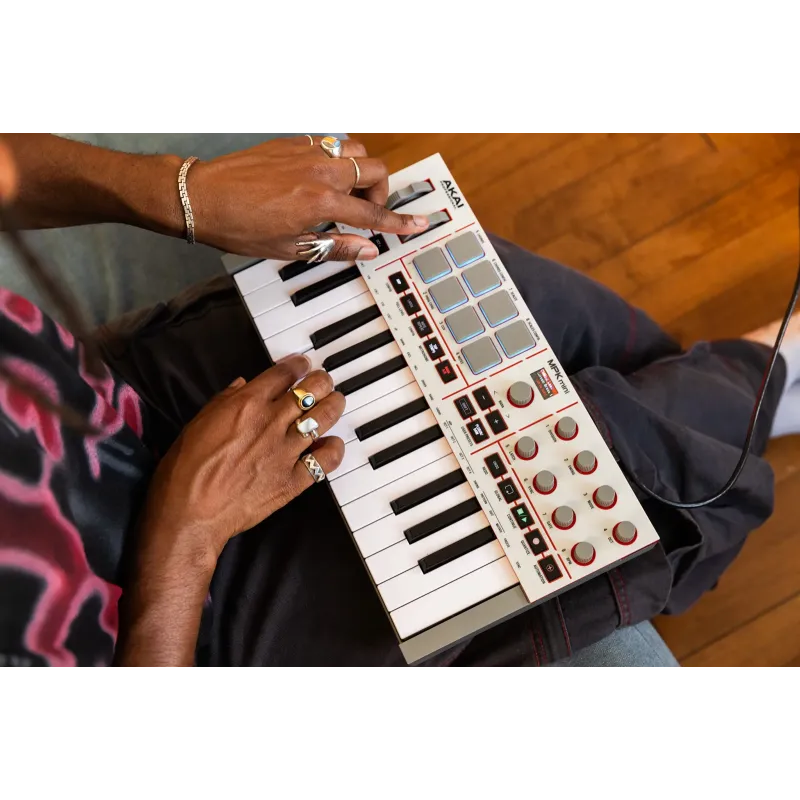 Clavier maître AKAI PROFESSIONAL - MPKMINI4 Mini touches - 25 touches, 8 pads, 8 encodeurs